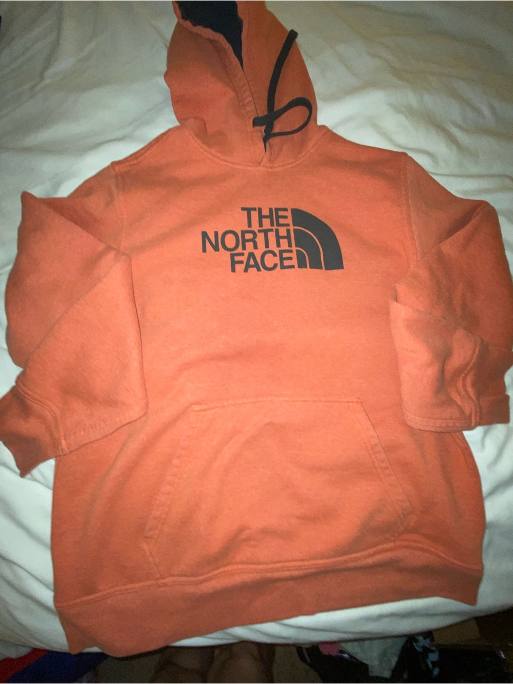 The North Face Orange Pullover Hoodie with Black Logo